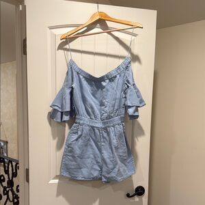 Zara Blue Off-Shoulder Jumpsuit with Ruffled Sleeves and Defined Waist